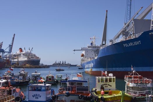Variety of ships and boast in the busy harbour of the UNESCO World Heritage port city of Valparaiso in Chile.