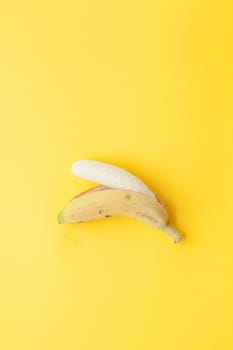 Peel banana and fruit on a yellow background and colorful background