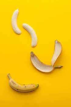 Peel banana and fruit on a yellow background and colorful background