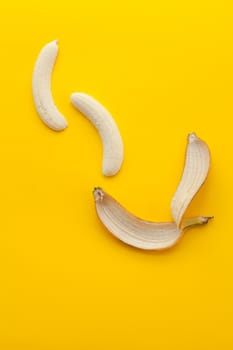 Peel banana and fruit on a yellow background and colorful background