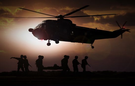 Military rescue helicopter during sunset
