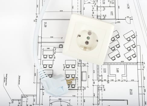 Architecture plan and rolls of blueprints with plug and socket. Building concept