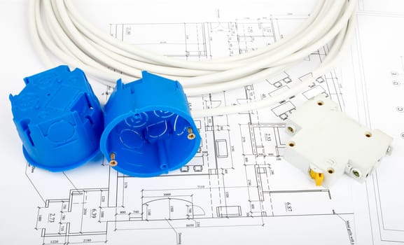 Architecture plan and rolls of blueprints with cabel and blue plastic covers. Building concept
