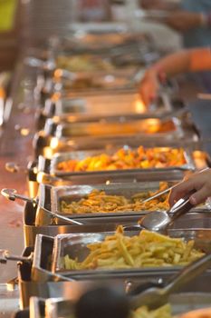 The line of self-service restaurant..Buffet trays