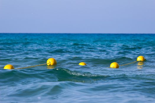 Yellow buoys in the sea