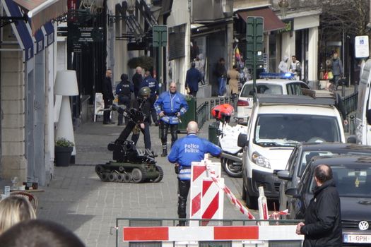 BELGIUM, Brussels: DOVO-SEDEE bomb disposal robot is pictured in action on the Rue de la Madeleine, close to Bruxelles-Central - Brussel-Centraal train station, in Brussels, on March 22, 2016, few hours after terror explosions hit Zaventem international airport and Maelbeek - Maalbeek subway station.