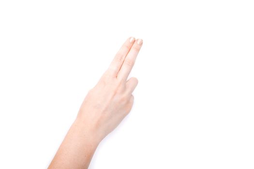 Female hand showing gesture on an isolated white background