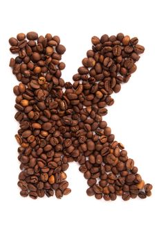 Alphabet letter K of roasted coffee beans isolated on white background
