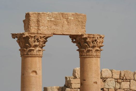 SYRIA, Palmyra : A picture shows ruins of the antique city of Palmyra located on an oasis in central Syria on April 13, 2010. Syria's antiquities chief hailed the imminent recapture of the ancient city of Palmyra from the IS group and vowed to rebuild the famed monuments the jihadists have destroyed, on March 24, 2016.