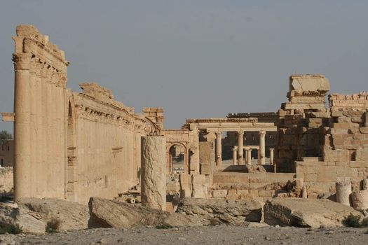 SYRIA, Palmyra : A picture shows ruins of the antique city of Palmyra located on an oasis in central Syria on April 13, 2010. Syria's antiquities chief hailed the imminent recapture of the ancient city of Palmyra from the IS group and vowed to rebuild the famed monuments the jihadists have destroyed, on March 24, 2016.