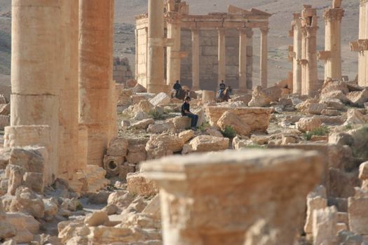 SYRIA, Palmyra : A picture shows ruins of the antique city of Palmyra located on an oasis in central Syria on April 13, 2010. Syria's antiquities chief hailed the imminent recapture of the ancient city of Palmyra from the IS group and vowed to rebuild the famed monuments the jihadists have destroyed, on March 24, 2016.