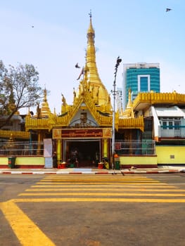 Yangon, Myanmar - APR15 : The Sule Pagoda in the day light on Thingyan Water Festival April 15,2013 in Yangon, Myanmar. Sule Pagoda located in the heart of Yangon.