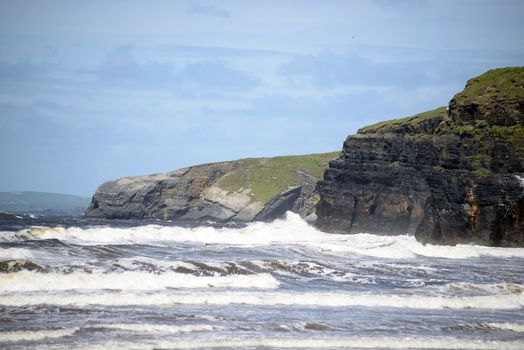 waves and cliffs on the wild atlantic way in Ballybunion county Kerry Ireland