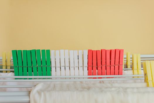 coloured clothespines red,green and white form italian flag