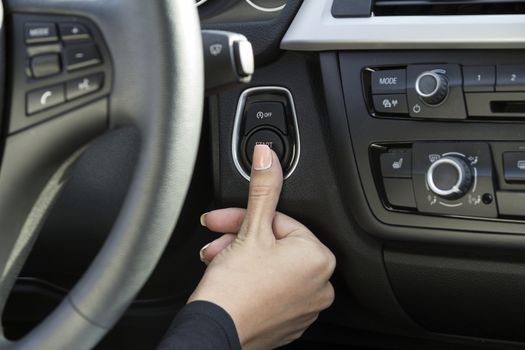 close-up of a girl's hand on the dashboard in a car