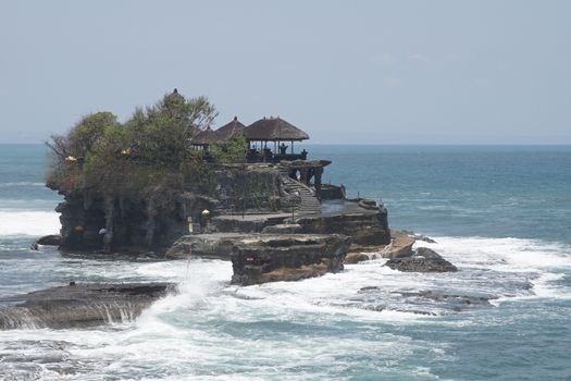 BALI, INDONESIA - SEPTEMBER 29, 2015: Tanah Lot temple during tidal water on September 29, 2015 in Bali, Indonesia
