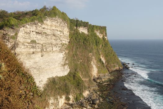 Cliff coast close to Uluwatu Temple, Bali, Indonesia