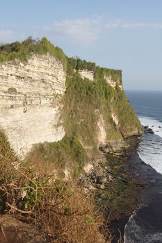 Cliff coast close to Uluwatu Temple, Bali, Indonesia