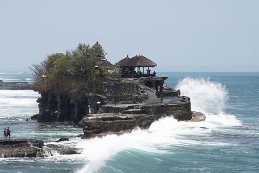 BALI, INDONESIA - SEPTEMBER 29, 2015: Tanah Lot temple during tidal water on September 29, 2015 in Bali, Indonesia