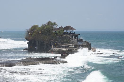 BALI, INDONESIA - SEPTEMBER 29, 2015: Tanah Lot temple during tidal water on September 29, 2015 in Bali, Indonesia