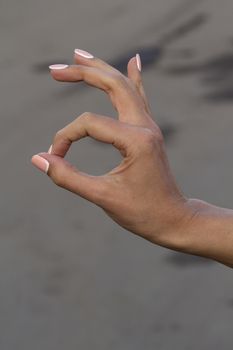 girl does the pointing hand movement