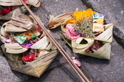 Hindu offerings and gifts to god in the temple in Bali Indonesia