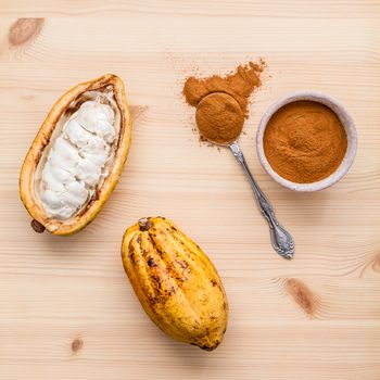 Ripe Indonesia's cocoa  setup on rustic wooden background.