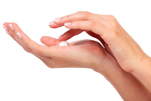 Female hands with a cream, isolated on a white background