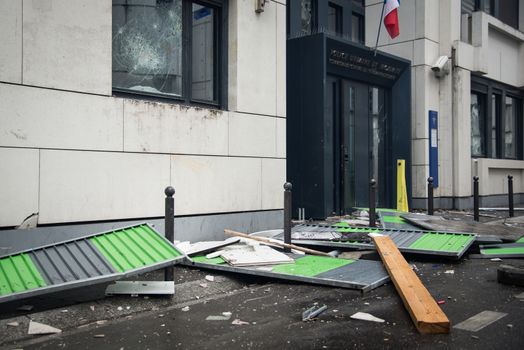 FRANCE, Paris: A police station of Paris 19th arrondissement is seen damaged, on March 25, 2016, after young people throw projectile against it, in a sign of protest against alledged police violence on a student during a demonstration of youths against the French labour law reform.A video of a policeman punching a student went viral on social media on March 24, and an enquiry has been opened into the incident. Tens of thousands of students protesting labour reforms took to the streets across France on March 24, torching cars in Paris and clashing with riot police who responded with tear gas and made more than 30 arrests.