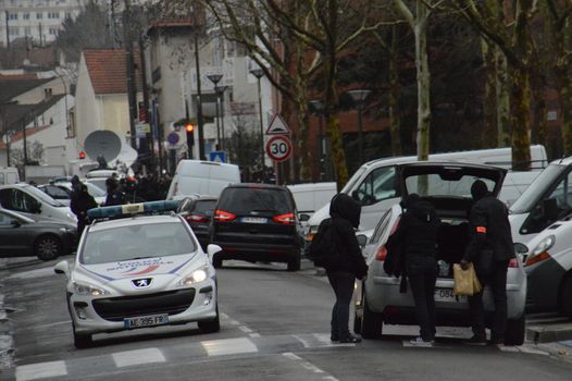 FRANCE, Argenteuil: Police officers walk in a street after a raid in the Argenteuil neighbourhood northwest of Paris on March 25, 2016. French Interior Minister Bernard Cazeneuve said police had arrested a suspect in the Paris area today who was in the advanced stages of a plot to attack France.