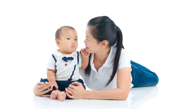 Asian mother and baby indoor portrait