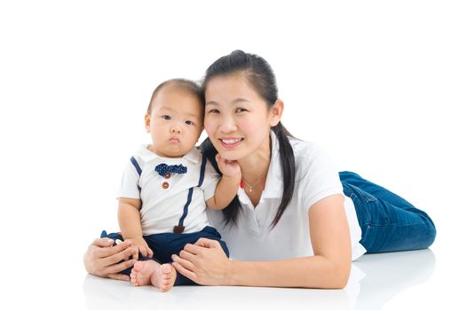 Asian mother and baby indoor portrait