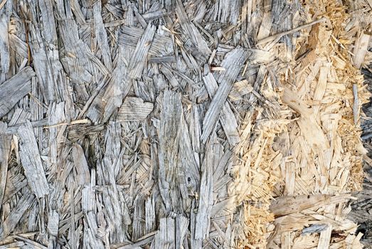 Wooden weathered grey pressed shavings natural background