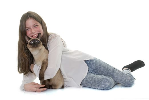 child and siamese cat in front of white background