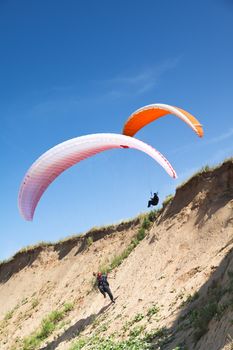 paraglider on the blue sky