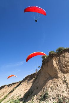 paraglider on the blue sky