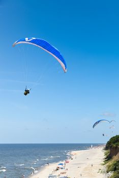 paragliding at the sea cost