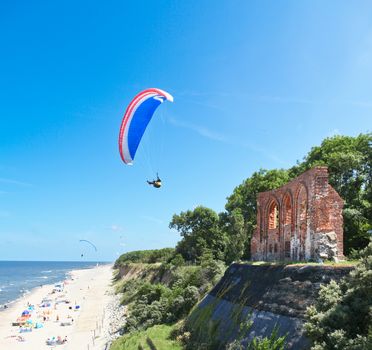 paragliding at the sea cost