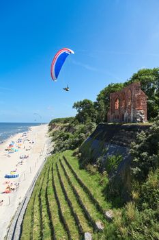 paragliding at the sea cost