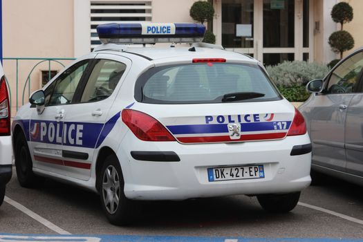 Menton, France - March 20, 2016: French Police (Police Nationale) Car Peugeot 308 Parked in a Parking Lot in Front of the Police Station in Menton 