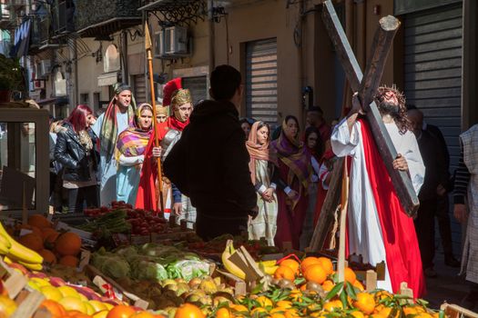ITALY, Palermo: A man poses as Jesus Christ on Good Friday, March 25, 2016, as he leads the traditional procession of mysteries (processione del misteri) in Palermo, Italy. The procession comes at the end of the Holy Week, just days before Easter Sunday.