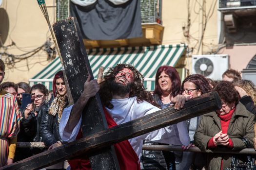 ITALY, Palermo: A man poses as Jesus Christ on Good Friday, March 25, 2016, during the traditional procession of mysteries (processione del misteri) and reenactment of the crucifixion in Palermo, Italy. The procession comes at the end of the Holy Week, just days before Easter Sunday.
