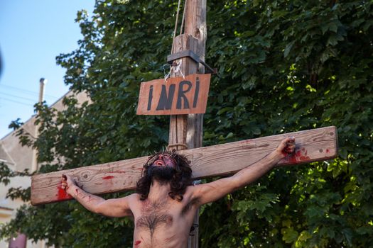 ITALY, Palermo: A man poses as Jesus Christ on Good Friday, March 25, 2016, during the traditional procession of mysteries (processione del misteri) and reenactment of the crucifixion in Palermo, Italy. The procession comes at the end of the Holy Week, just days before Easter Sunday.