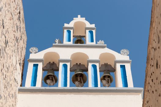 Belfry with three bells in Santorini, Greece