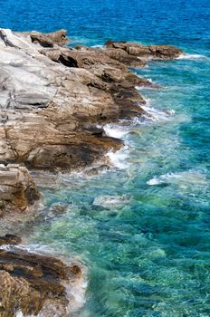 The rocky coast of Naussa, Paros, Greece