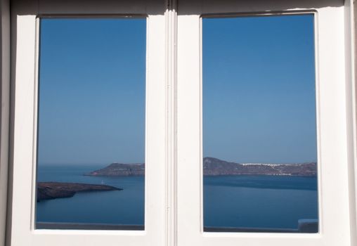 Panorama view to the caldera of Santorini through the window