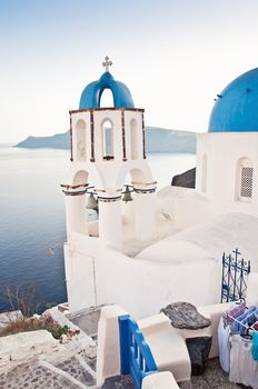 Vintage belfry in Oia, Santorini. Oia is a village in the north west edge of the Santorini island with white houses, narrow streets and amazing seaviews.