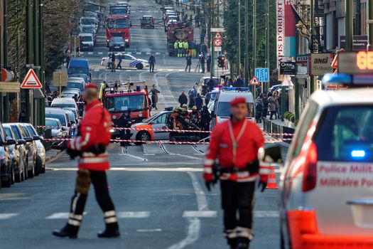 BELGIUM, Brussels: Police, military  and bomb squad secure the area around Vanderkindere street as a SEDEE bomb disposal robot is at work in Uccle district, southern Brussels on March 26, 2016 after suspicious bag pack was found. Buildings around Ici Paris XL shop on Vanderkindere street were evacuated, public transports were temporarily shut down until police found out it was a false alarm. Brussels has been on high alert since the terror attacks of 22 March in the Belgian capital that left at least 31 dead. 