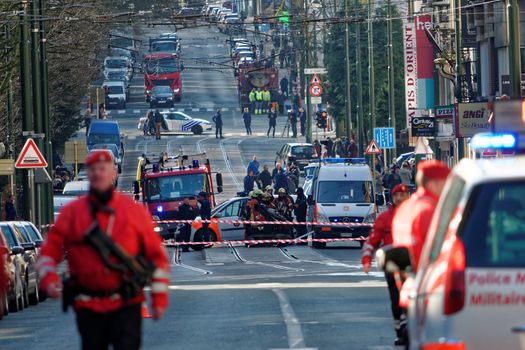 BELGIUM, Brussels: Police, military  and bomb squad secure the area around Vanderkindere street as a SEDEE bomb disposal robot is at work in Uccle district, southern Brussels on March 26, 2016 after suspicious bag pack was found. Buildings around Ici Paris XL shop on Vanderkindere street were evacuated, public transports were temporarily shut down until police found out it was a false alarm. Brussels has been on high alert since the terror attacks of 22 March in the Belgian capital that left at least 31 dead. 