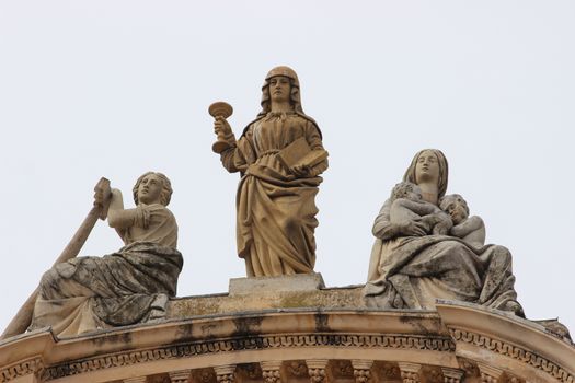 Catholic Sculptures on the Facade of a Saint-Michel-Archange Church in Menton, French Riviera